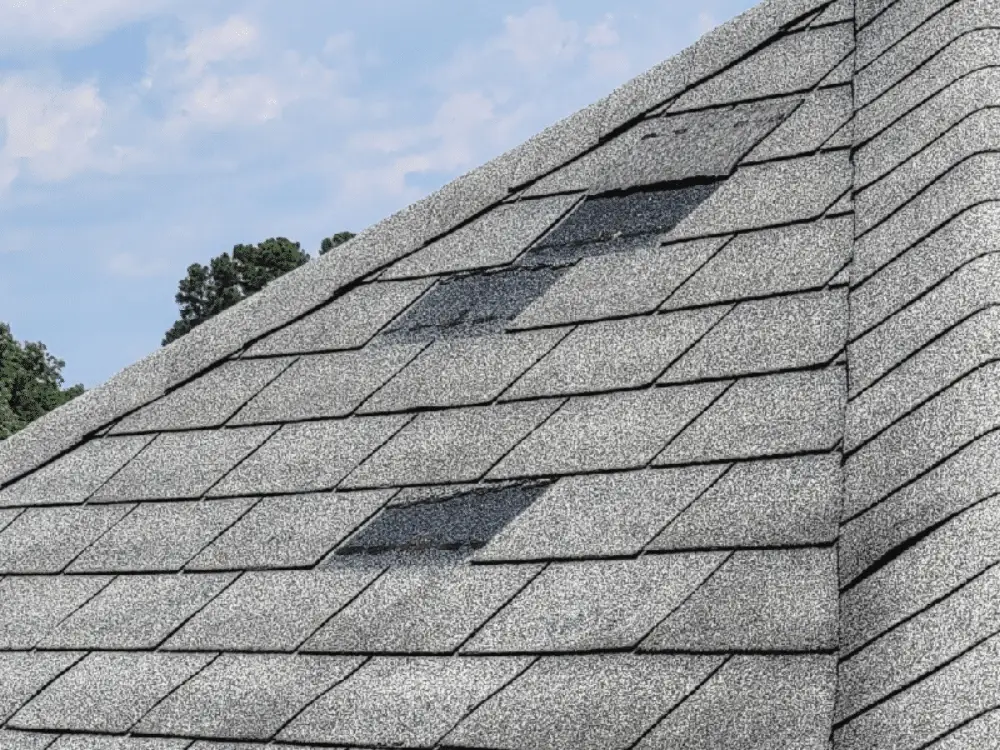 Loose Roof Shingles - Repair Them Before Storm Damage